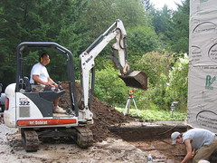 Mark at Tight Access Excavating, with our helper, a local high school student named Michael